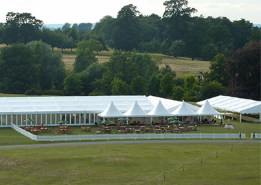 example of a temporary structure - large white clearspan marquee and pagoda marquees